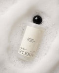 Soléra Care Fresh Floors probiotisk gulvvask liggende i hvidt rengøringsskum